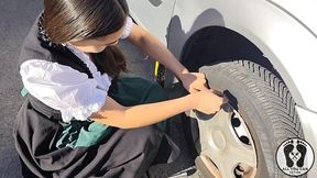 dirndl slut gets dirty and oily changing tires