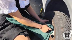 dirndl slut gets dirty and oily changing tires