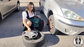 dirndl slut gets dirty and oily changing tires