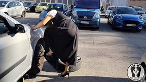 dirndl slut gets dirty and oily changing tires