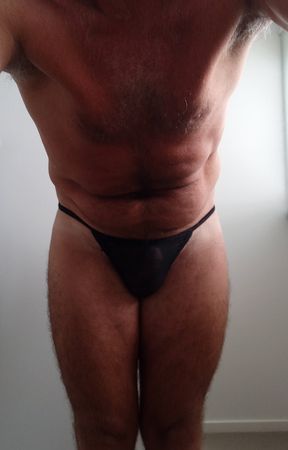 dragontrainer5 exhibits himself in g string, showing and fingering his ass hole