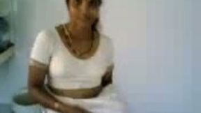 Indian amateur housewife showed off her natural tits on camera