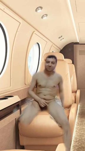 Nude boy masturbation on seat of the virtual Air plane.
