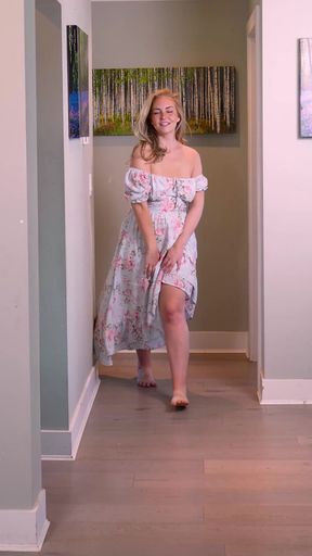 Curvy girl in blue floral dress struts her stuff for the camera