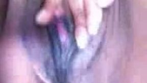 Whorish ebony chick demonstrates her soaking twat on webcam