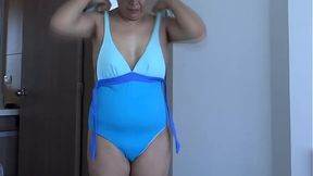 Beautiful stepmother puts on a bikini to show off on the beach &mdash;  compilation