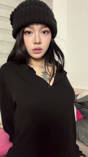 Asian girl in black beanie