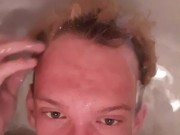 Very skinny teen shows himself putting his head underwater