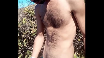 Gozando na praia