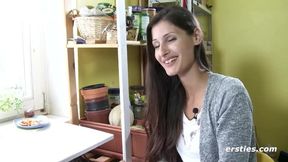 German student with a shaved pussy pleasures herself up close with a dildo