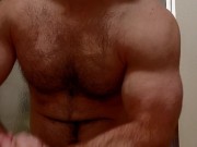 HAIRY MUSCLE BEAR FLEXING BEFORE SHOWER