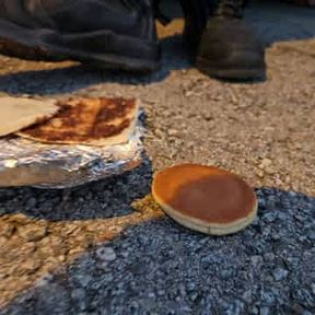 Sandwich ans chocolate bun crushing whit work boots