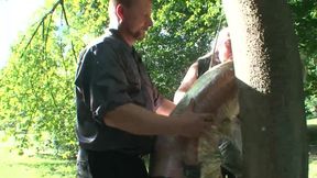 Dominates humiliates chaining in the farm