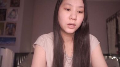 T-shirted Asian ASMR cutie reads pharaoh tale solo at home