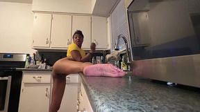 Her well-endowed black stepbrother fucks her hard by the kitchen counter