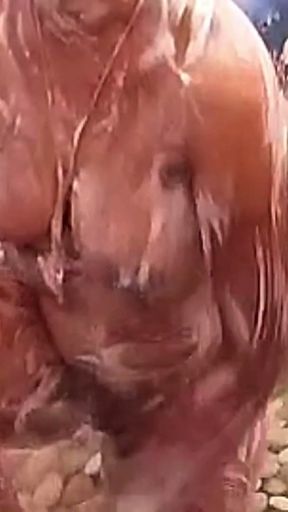 Ammu is applying soap to her breasts139   Clip 1