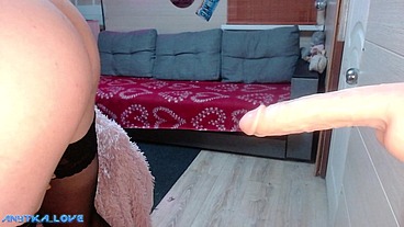 Riding a huge dildo
