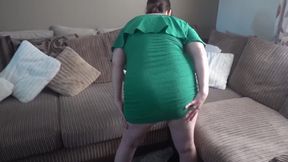 Stripping in Green Dress