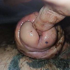 Jerking off the cock head and shaft and finger fucking in the urethra that  has as split in half