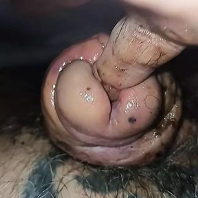 Jerking off the cock head and shaft and finger fucking in the urethra that  has as split in half