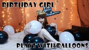 Birthday Girl Plays with Balloons