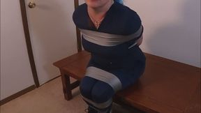 Nurse Mindy tied up with tape and gagged