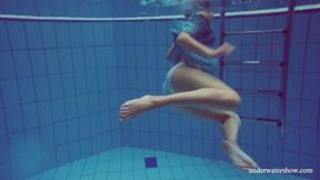 Hot tight teen Marusia swims naked underwater