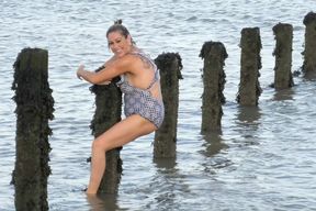 Skinny dipping MILF gets fucked by the sea
