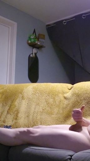 crossdresser layed on sofa playing with her self wearing nothing but her kitten heels and bra   Clip 1