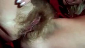 Webcam solo with a granny demonstrating her extremely hairy cunt