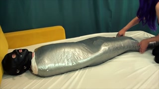 Long-term mummification. Encasement duct tape bondage