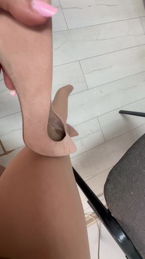 Horny mature secretary lifts her long and sexy legs in public to show her office colleagues what stockings she is wearing