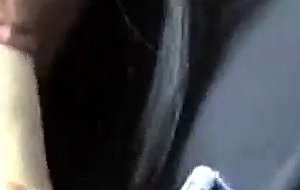 Cute asian sucks big cock while driving