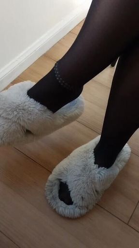 Feet in slippers.