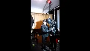 Rubber Gimp Gets Intense Electro–Stim Training in BDSM Latex Scene