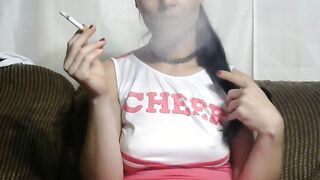 smoking cheerleader eye contact while smoking ciggy