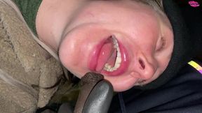 homless woman poked in the face with a cock