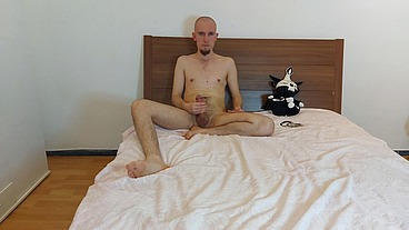 Young man puts a toy on his dick