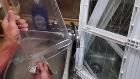 Cute boy teases while cleaning the fridge