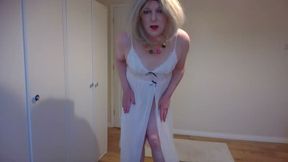 Blonde in long white nightgown, red high heels and G-string