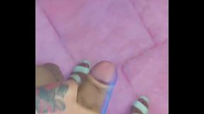 Trans girl Emma Ink shows off in the mirror in high heels and a short dress. Without panties his big dick was loose