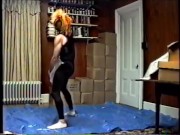 wearing black tights & crop top, stocking mask & wig hump air pillow 1990's