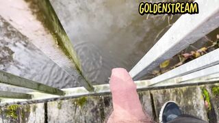 Nubile guy wants to urinate on a public bridge and plays with his penis!