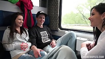 Two girls and two guys are having a foursome in the public train and enjoying it