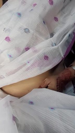 Beautiful Bangladeshi girl wearing a saree showing off her beautiful figure