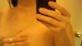 Sara topless in the mirror