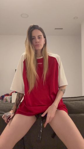 Sexy blonde woman in red jersey