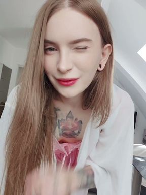 Shemale with a monster cock puts on satin lingerie