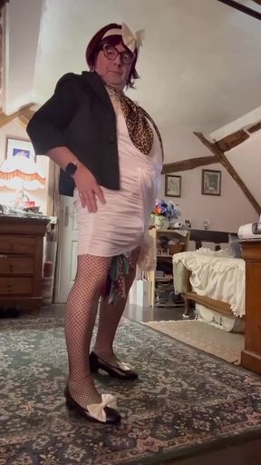 Dressed in a short little evening dress for a night out