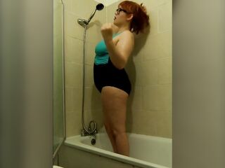BBW Penny showering in black swimsuit